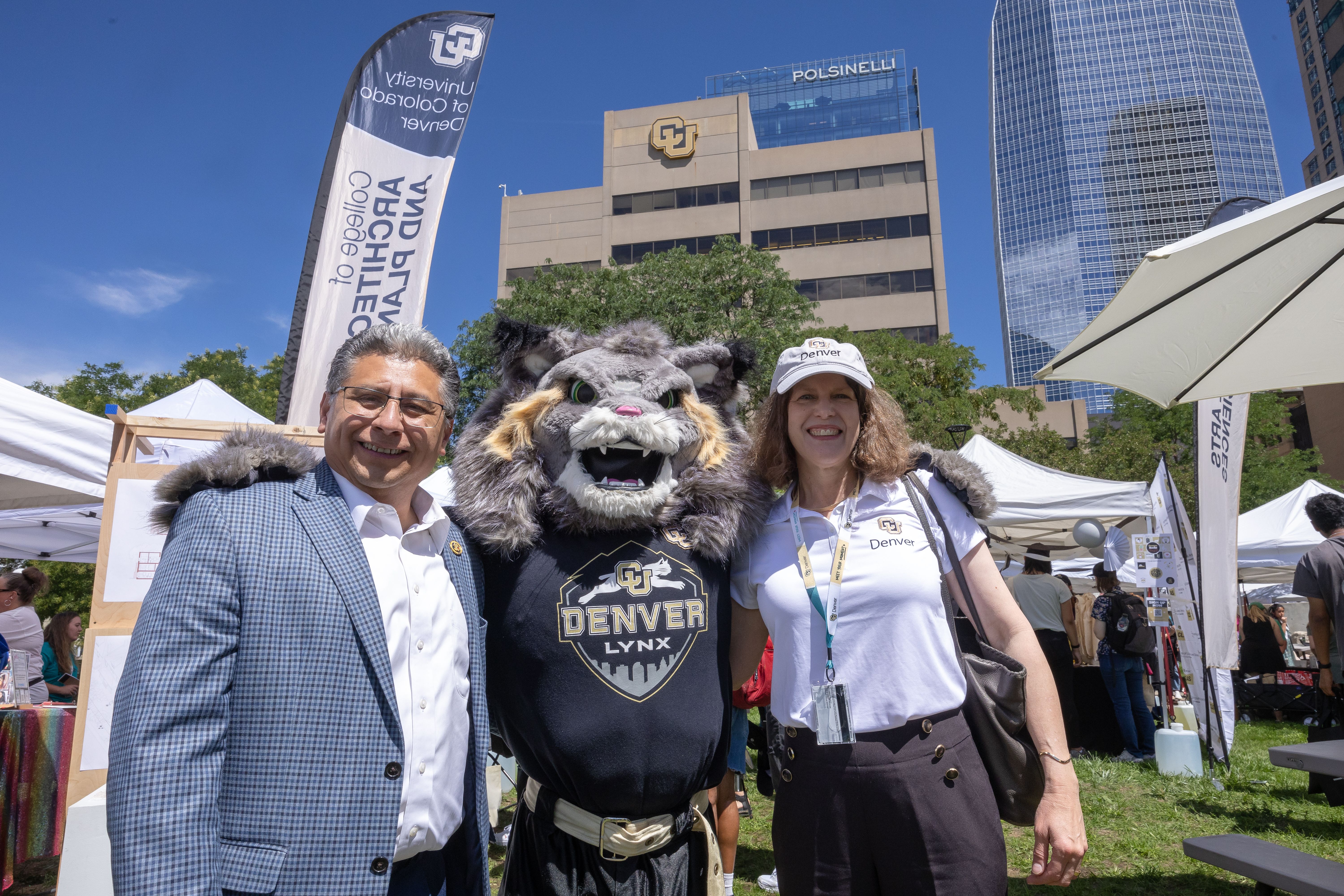 Rep. Greg Lopez (R-CO), CU Denver Mascot Milo the Lynx, and CU Denver Interim Chancellor Ann Schmiesing posing for a photo at the CU Denver Block Party