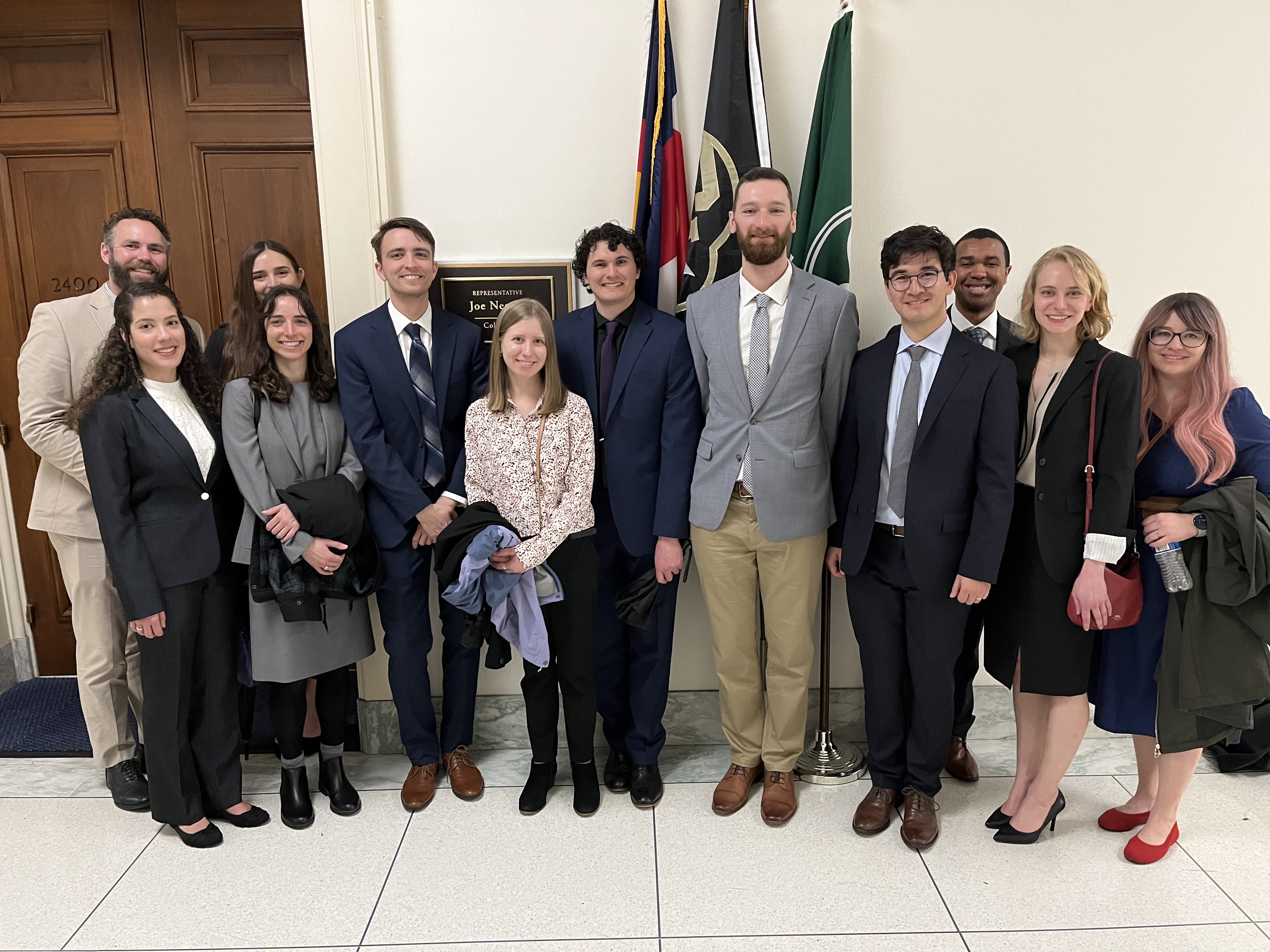 CU Boulder Smead Engineering Scholars posing at the office of Rep. Joe Neguse (D-CO)