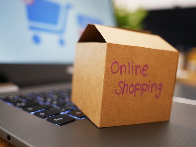 Small shipping box sitting on laptop keyboard